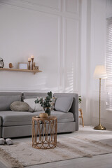 Sticker - Living room with comfortable grey sofa and stylish interior elements