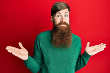 Sticker - Redhead man with long beard wearing casual clothes clueless and confused with open arms, no idea and doubtful face.