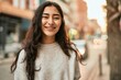 © Krakenimages.com - Young middle east girl smiling happy standing at the city.
