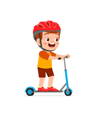 Wall Mural - cute little boy riding scooter and wear helmet