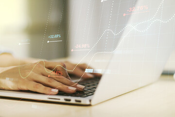 Abstract creative analytics data spreadsheet with hands typing on laptop on background, analytics and analysis concept. Multiexposure