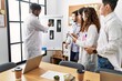 © Krakenimages.com - Group of young doctor people discussing in a medical meeting at the clinic office.