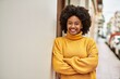 © Krakenimages.com - Young african american girl smiling happy with arms crossed gesture at the city.