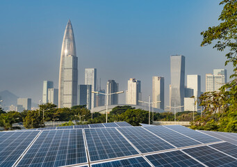 Wall Mural - ecological energy renewable solar panel plant with urban landscape landmarks