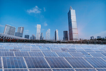 Wall Mural - ecological energy renewable solar panel plant with urban landscape landmarks