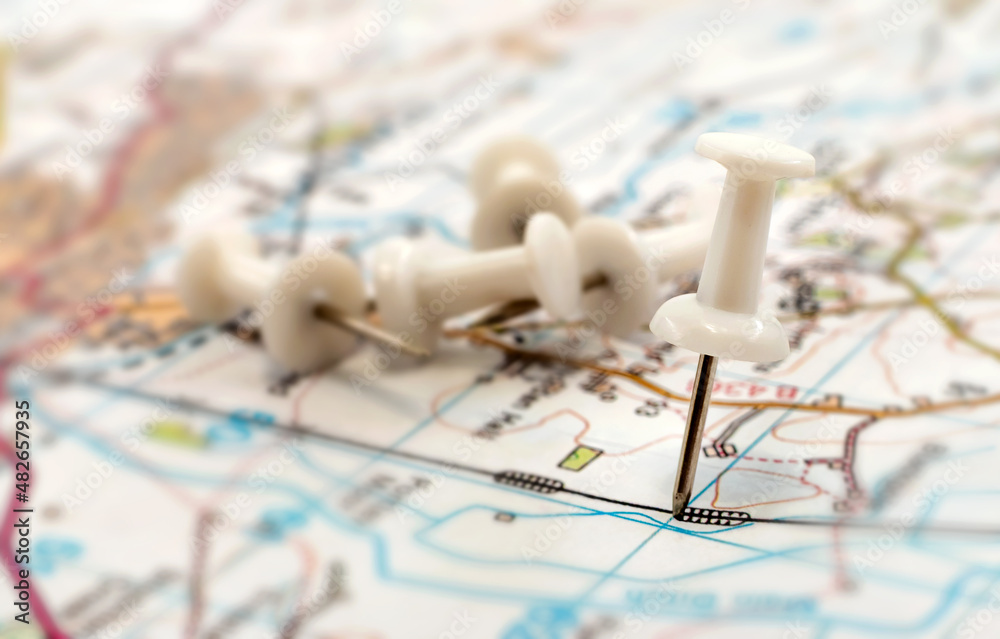 A paper clip on the map shows the end point of the route. Travel guide ...