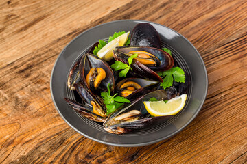 Sticker - Mussels in wine with parsley and lemon. Seafood.