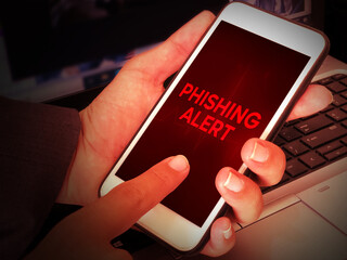 Poster - Phishing Alert Message on Mobile Screen in Red Alarming Color Background. Technology and security concerns backdrop