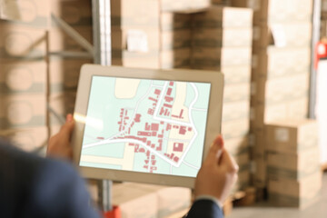 Poster - Manager with tablet working at warehouse, closeup. Logistics center