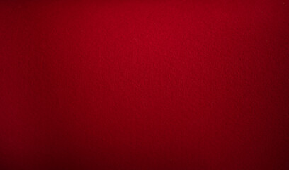 Wall Mural - Photo of the texture of the reddish fabric. Felt of red color. Pure red background for text.