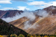 USA, Idaho, Ketchum, Soft Clouds Hanging Above Hills