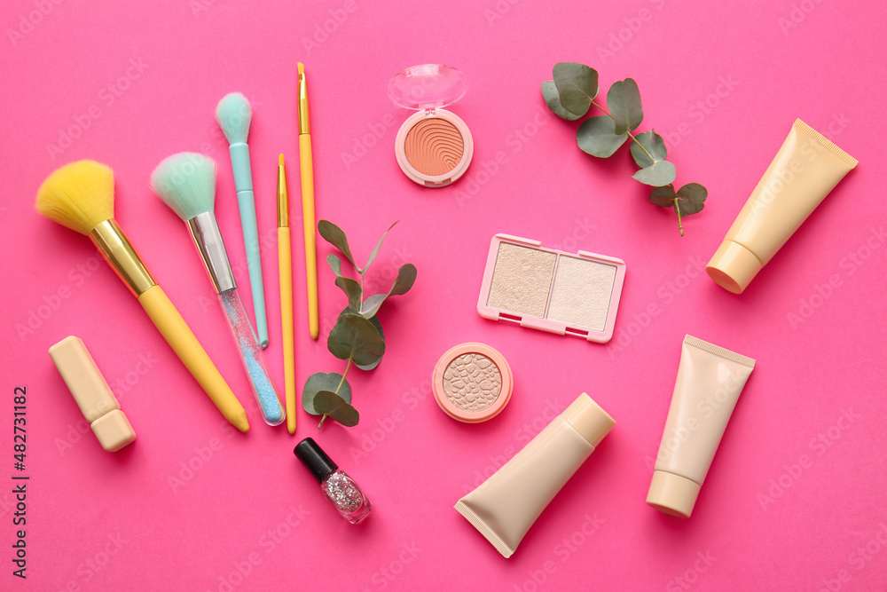 Decorative cosmetics on pink background