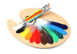 Palette with paints and brushes on white background. Artist equipment
