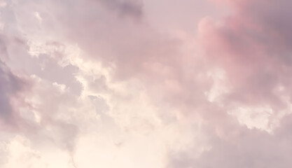 Wall Mural - Background of blue sky with pink clouds in sunset