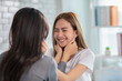 © 220 Selfmade studio - Beautiful asian young lesbian LGBTQ couple or friends touching cheek and looking together smile and relax at home.Happiness LGBTQ couple woman spending time together at home. LGBTQ Lifestyle Concept