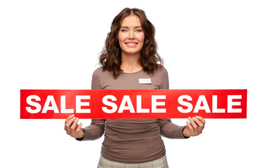 Wall Mural - sale and business concept - happy female shop assistant or saleswoman holding red banner over white background