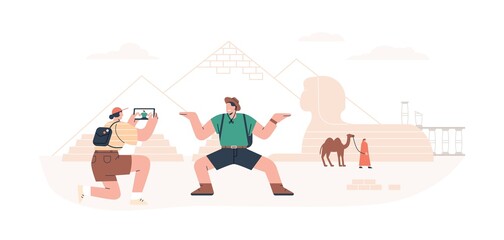 Wall Mural - tourists taking photo with pyramids during travel to egypt. couple visiting landmarks on holiday tou