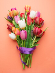 Colorful bouquet of tulips on white background.