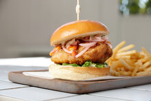 Fish Burger On Board With Fries