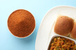 Pav Bhaji Masala Curry Powder with Mumbai Style Pav bhaji is a fast food dish from India, consists of a thick vegetable curry served with a soft bread roll, served in a plate