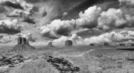 Sticker - Black and white sunset over Monument Valley, a region of the Colorado Plateau between Arizona and Utah - USA