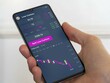 © maurice norbert - Stock exchange market chart etf, Stock market data on smartphone. Business analysis of an Low Carbon ETF