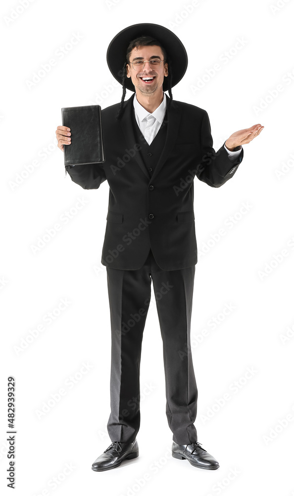 Hasidic Jewish man with Torah on white background