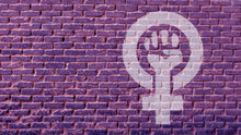 Drawing Of Strong Fist Raised Up With Woman Gender With Copy Space Aside On Wall