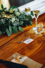 Wall Mural - A vertical shot of different wedding decorations on a wooden table