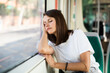 © JackF - Young female passenger sleeps sitting in tram