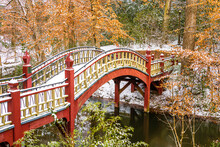Bridge In Autumn With Snow