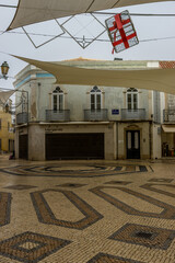 Wall Mural - The old buildings of Faro during a rainy day in Portugal