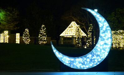 Sticker - Christmas light decorations in the city square at night