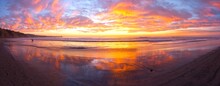 Beautiful Sunset Landscape Panorama On Torrey Pines State Beach.  Burning Sky Colors Seascape And Pacific Ocean Coastline In San Diego California USA