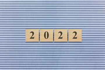 Wall Mural - Wooden cube block for 2022 on background , preparation for merry Christmas and happy new year