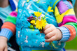 blooming flowers in little toddler girl hand