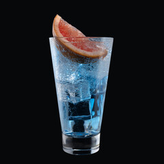 Wall Mural - Blue lagoon cocktail with Blue Curacao liqueur in a tall glass isolated on black background. Classic alcoholic cocktail