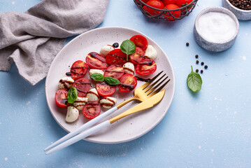 Wall Mural - Caprese salad with tomatoes and mozzarella