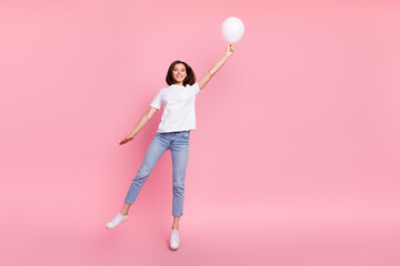 Sticker - Full size photo of funky carefree female jumping hold birthday decor white balloon isolated on pink color background