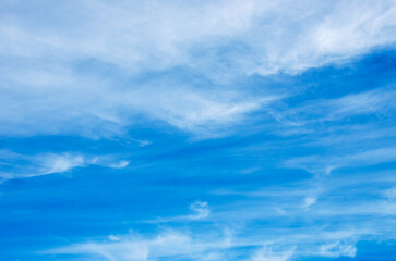 Wall Mural - blue sky background with white clouds