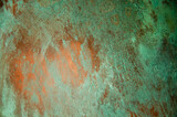 Oxidized copper background. copper oxide patina. natural texture copper material.green and blue copper patina