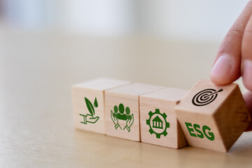 esg concept of environmental, social and governance. sustainable corporation development. hand flips