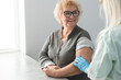 © Angelov - Senior woman being vaccinated against coronavirus by a female doctor