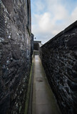 Fototapeta Natura - Narrow castle wall walkway Stirling Castle, Stirlingshire, Scotland - Passage way on top of castle defences
