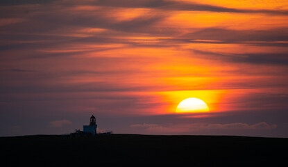 Brough of Birsay Lighthouse at Sunset, Island of Orkney, Scotland 