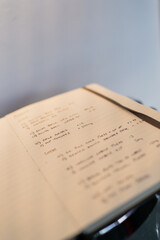 close up of notebook with workout fitness plan 