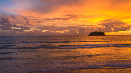 .aerial view stunning sunset above Pu island Kata beac Phuket Thailand. .Scene of colorful red light trough in the dark blue sky..Gradient color. Sky texture, abstract nature background.