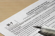Closeup of Form W-7, Application for IRS Individual Taxpayer Identification Number (ITIN).