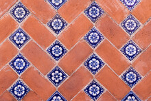 A Traditional Brick And Talavera Tiles Wall In Puebla City, Mexico