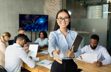 Poster - Asian HR Manager Giving Hand For Handshake At Camera During Corporate Meeting